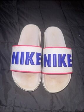 Nike White Slides with Blue Logo and Pink Accents